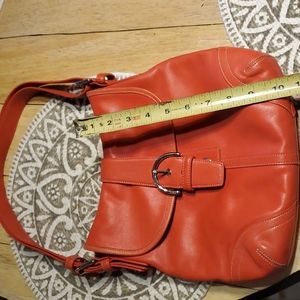 Coach leather medium sided hobo with silver accents